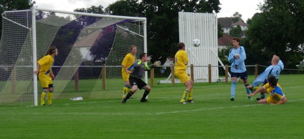 Aaron Day forces the ball home