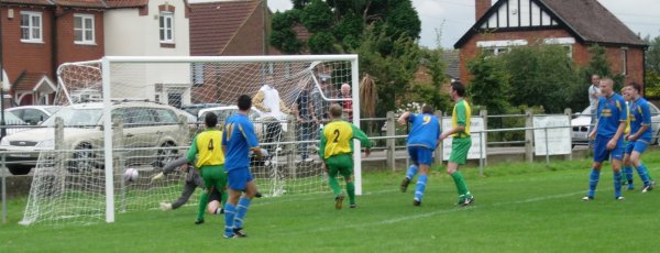 Richard James wheels away after opening the scoring for Harwicke against Berkeley Town